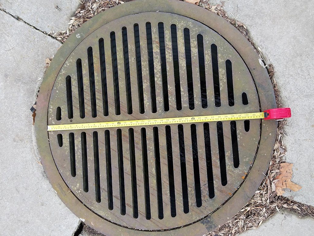 Manhole cover plumbing