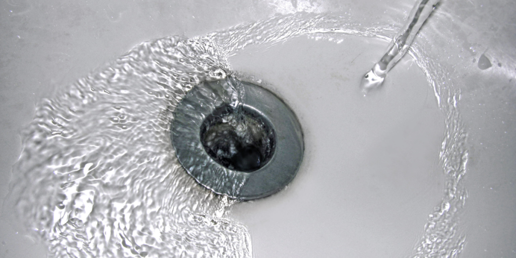 Flush Drains with Hot Water